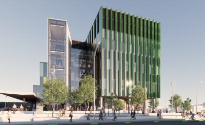 An artist's impression of the new hospital once completed. The modern building is green with large windows and white, black and grey features. There are trees and people in the front.